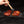 Sauce Shop sauce glazed over chicken thighs on a BBQ