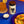 A jar of Sauce Shop Ranch Mayo next to a beverage, a dip pot with ranch mayo inside and sweetcorn ribs